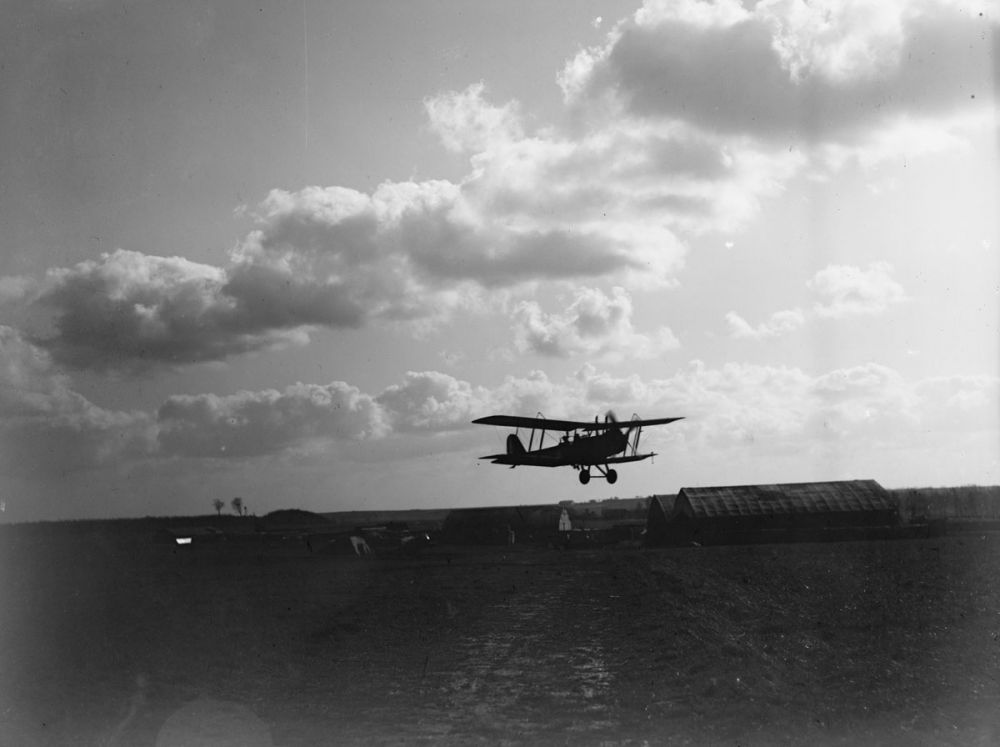 A Royal Aircraft Factory R.E.8 about to land at its aerodrome near Arras. 22 February 1918.